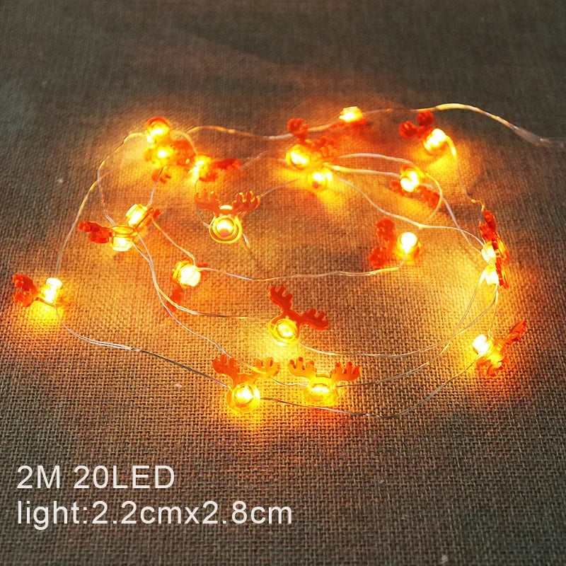 LED Weihnachts-Lichterkette 2M mit 20 LEDs - Batteriebetrieben mit Weihnachtsmann & Schneeflocken